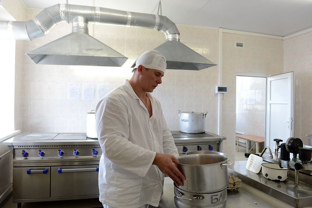 Cook cooks food for Prison hospital patients